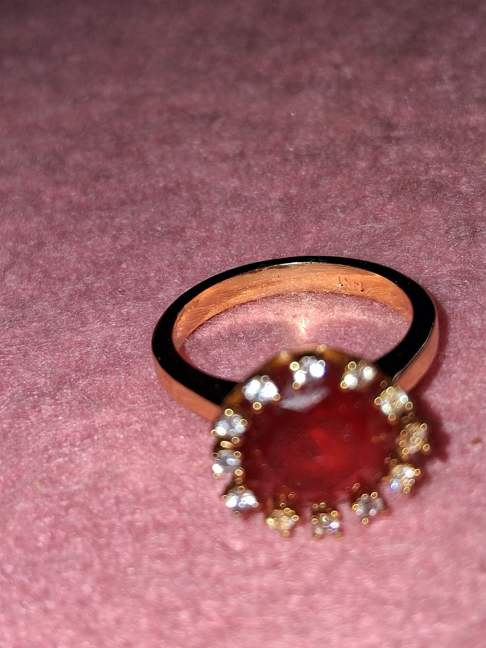 14 K Gp  Ring with Red Center Stone and Clear Accent Stones